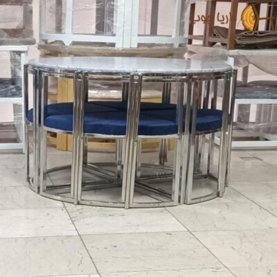 Small oval metal dining table for 6 people